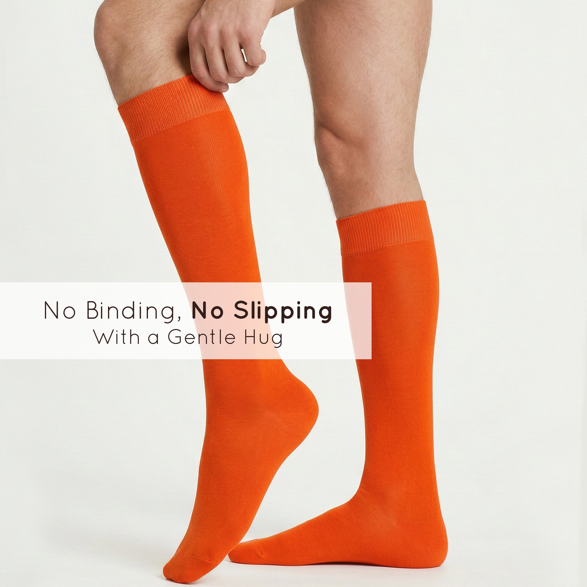 Unisex wearing orange Mysocks knee-high combed cotton socks