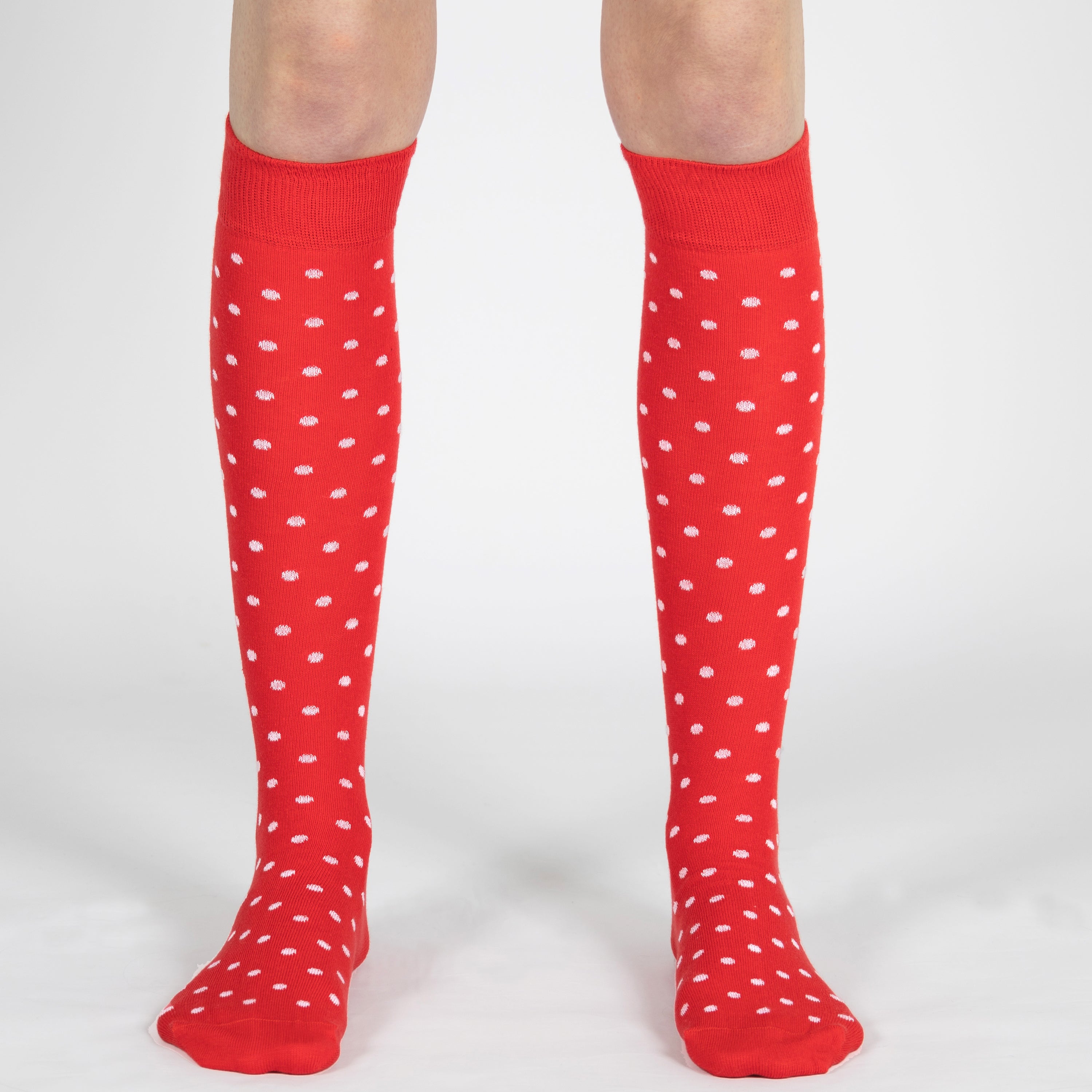 Red knee-high socks with white polka dots