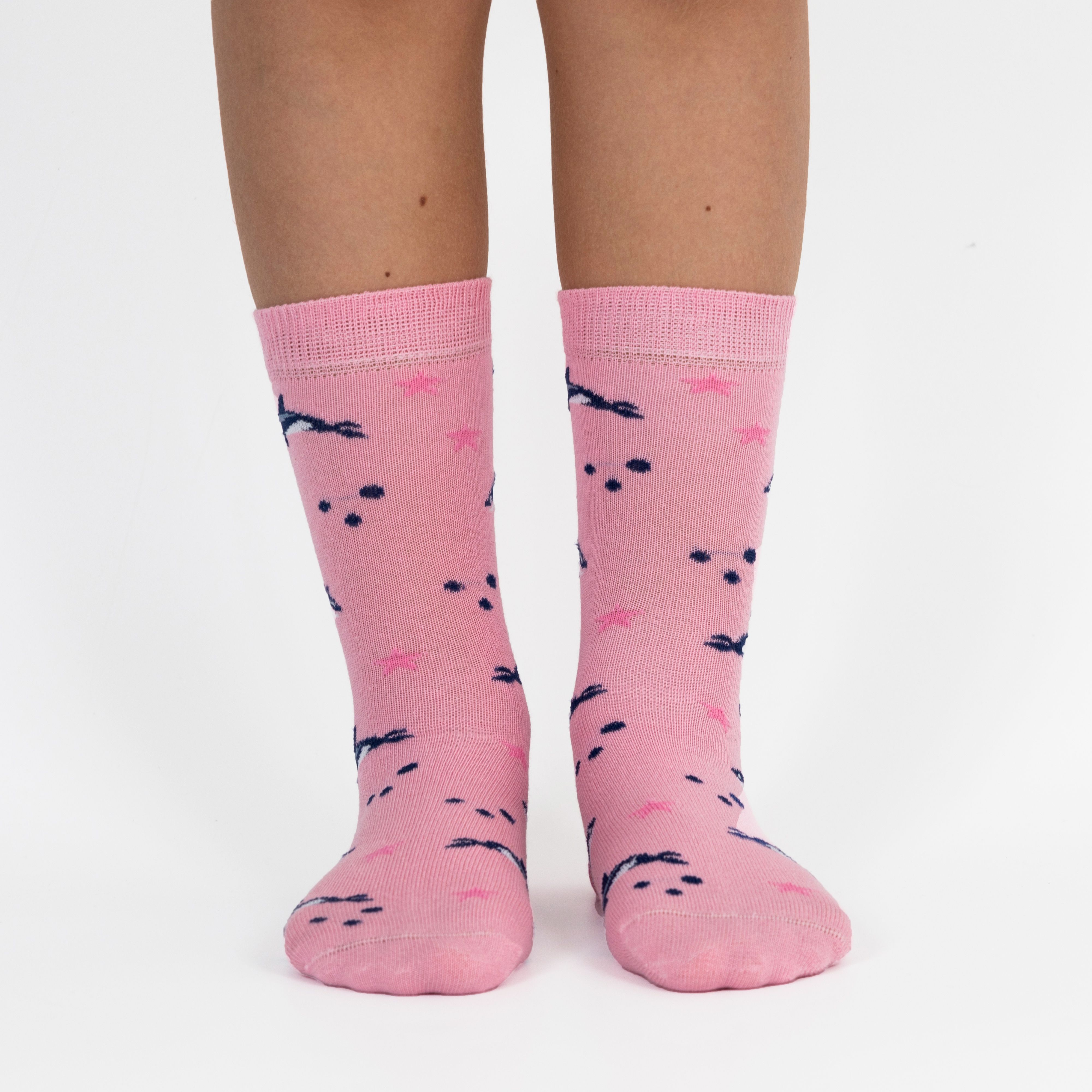 3 pairs of kids fish pattern crew socks in purple and pink with seamless toes.