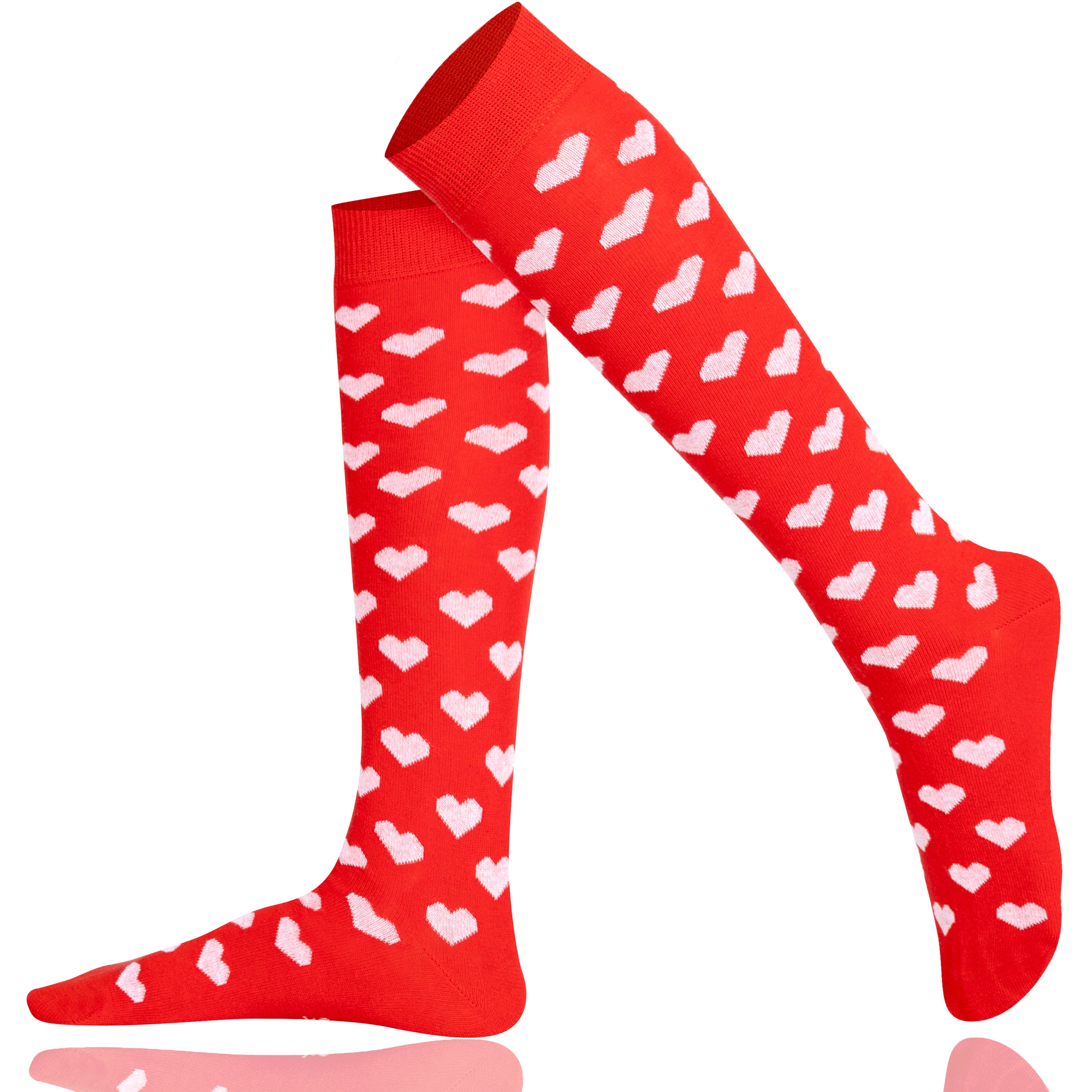 Red knee-high socks with white heart patterns on a white background