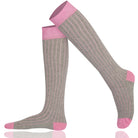 Pair of ribbed gray knee-high socks with pink accents 