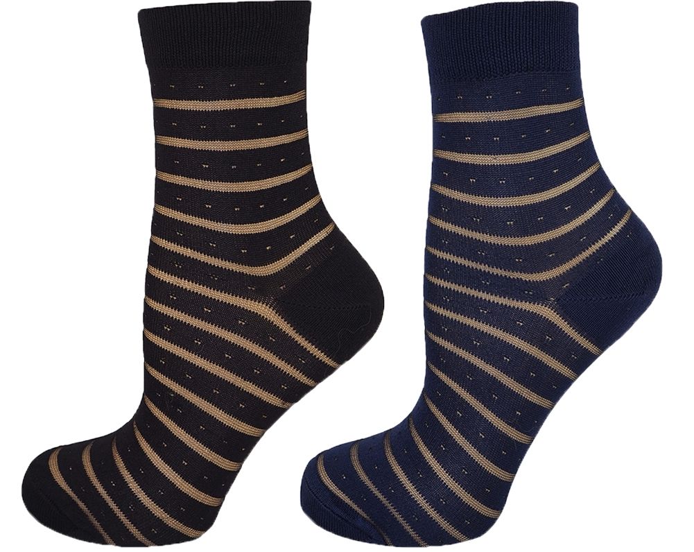 Pair of black and beige striped socks on a white background