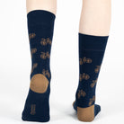 Navy blue unisex crew socks featuring a brown bicycle pattern and seamless toe design, made from premium combed cotton for men and women