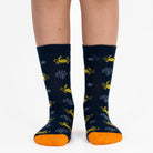 3 pairs of kids crab pattern crew socks in green, blue, and dark green.