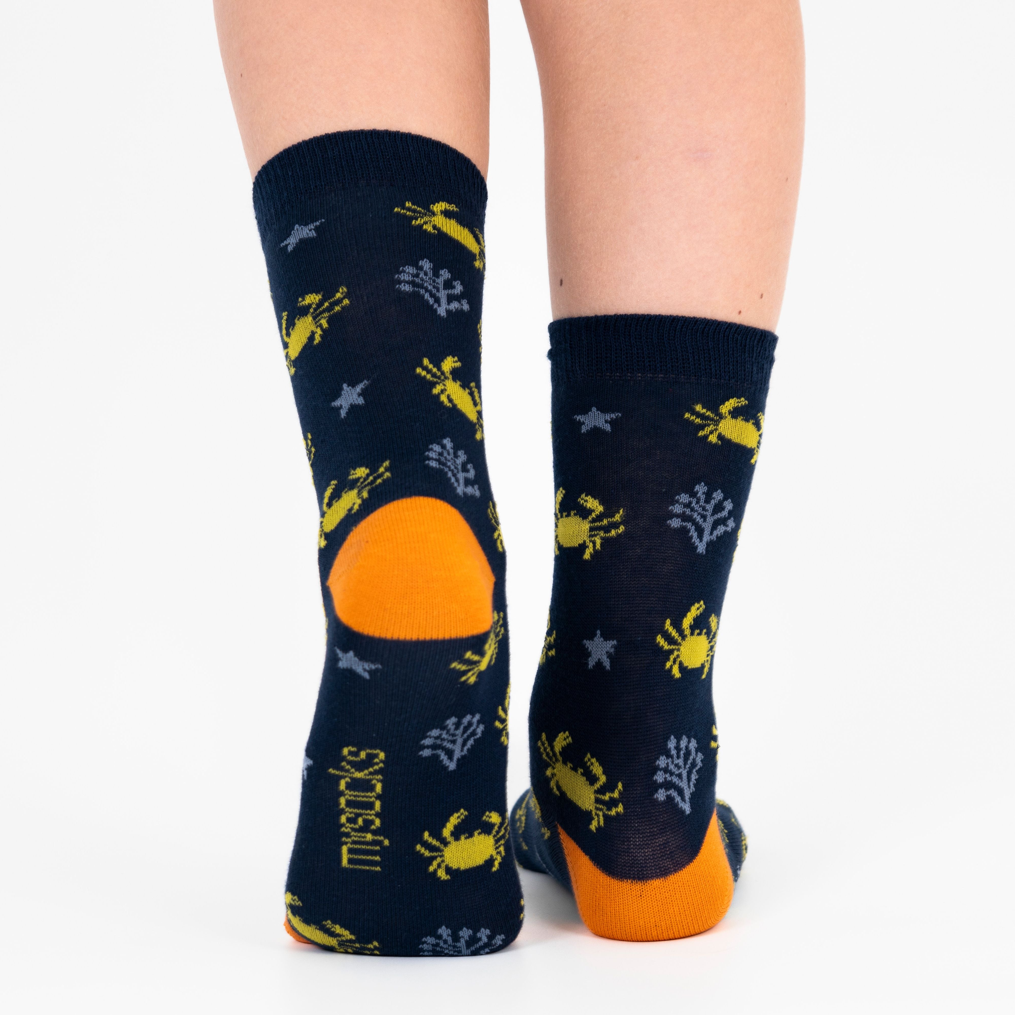 3 pairs of kids crab pattern crew socks in green, blue, and dark green.
