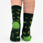 3 pairs of kids crab pattern crew socks in green, blue, and dark green.