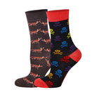 Two pairs of socks with different patterns on a white background