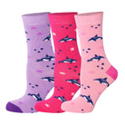 3 pairs of kids fish pattern crew socks in purple and pink with seamless toes.