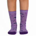3 pairs of kids fish pattern crew socks in purple and pink with seamless toes.
