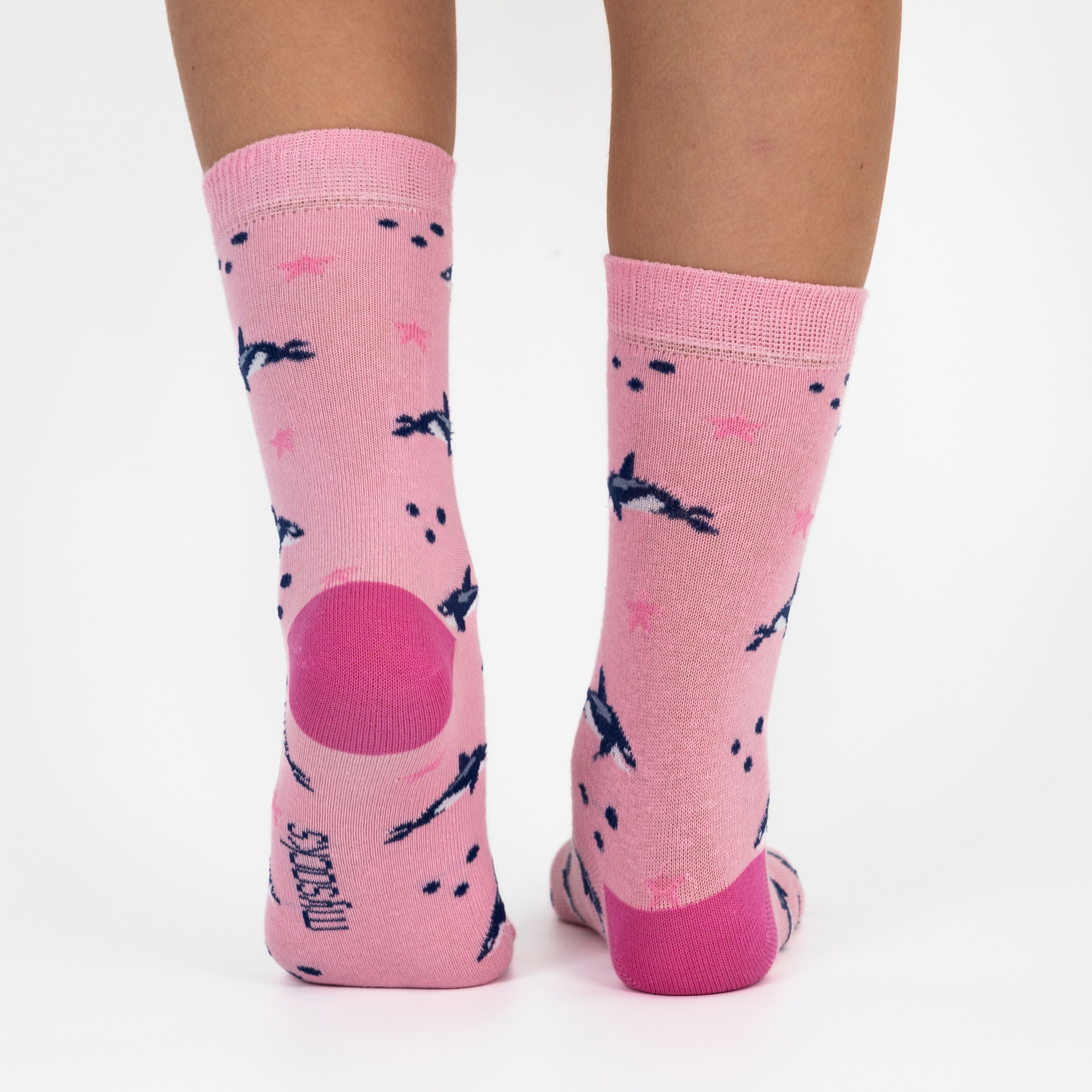3 pairs of kids fish pattern crew socks in purple and pink with seamless toes.