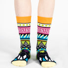 Pair of unisex Mysocks Aztec crew socks featuring vibrant geometric patterns in teal, yellow, and green, displayed on a white background.
