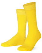 Pair of Mysocks unisex plain yellow crew socks made from combed cotton.