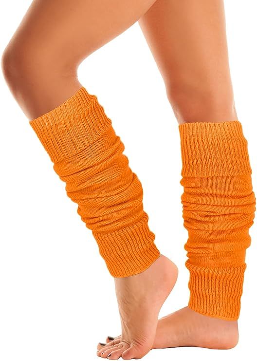 Woman wearing bright plain orange ribbed knit leg warmers.